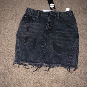 Black distress denim skirt
